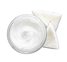 Jar of hand cream and coconut pieces on white background, top view