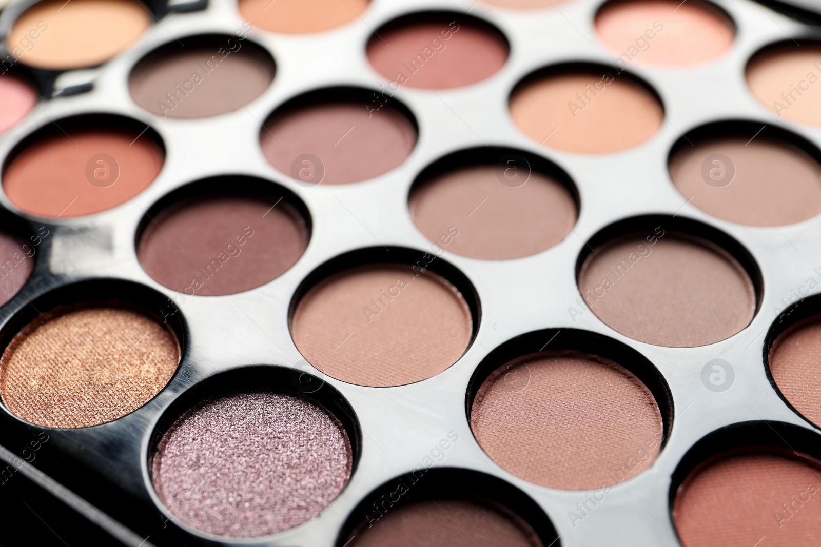 Photo of Beautiful basic eye shadow palette as background, closeup