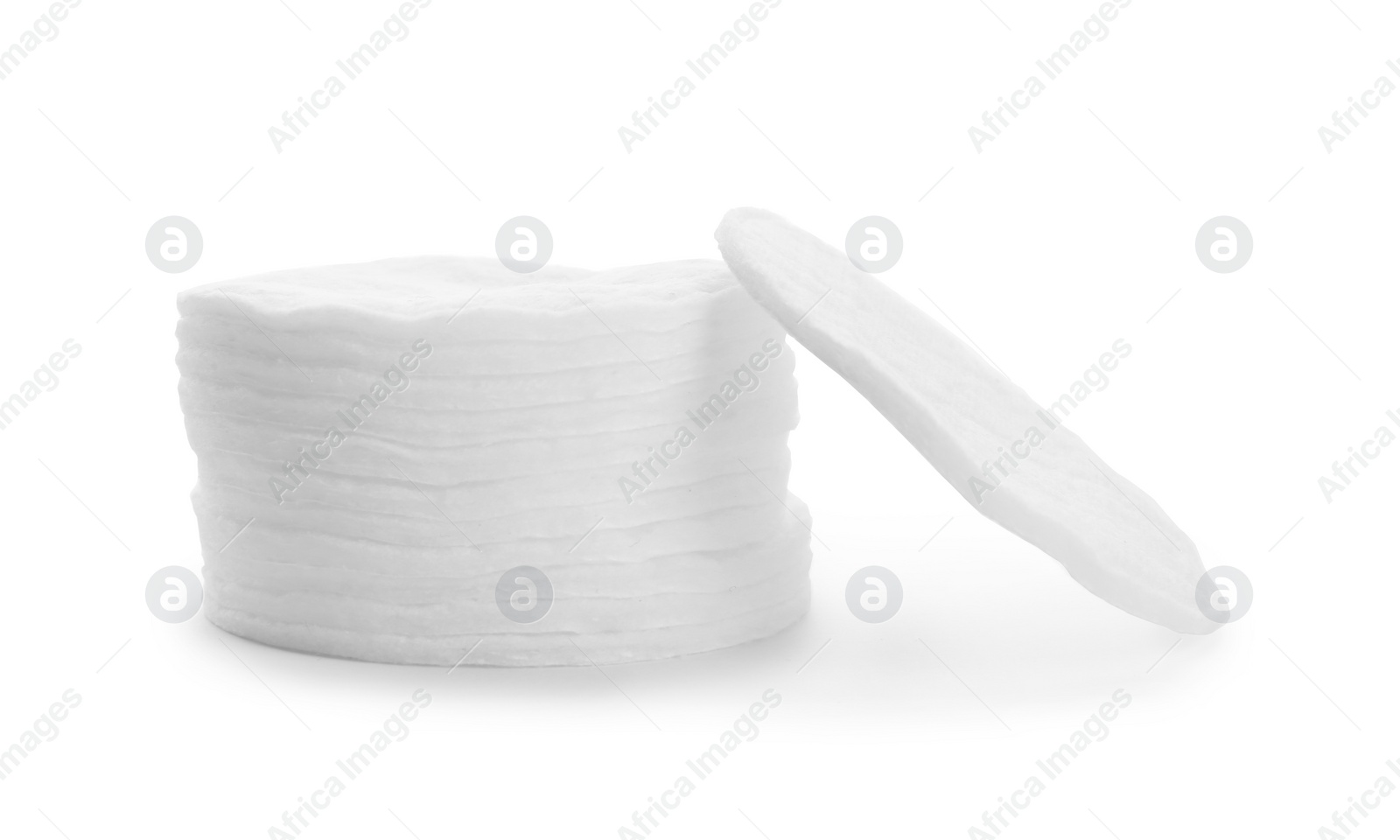 Photo of Stack of cotton pads isolated on white