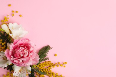 Photo of Beautiful floral composition with mimosa flowers on pink background, flat lay. Space for text