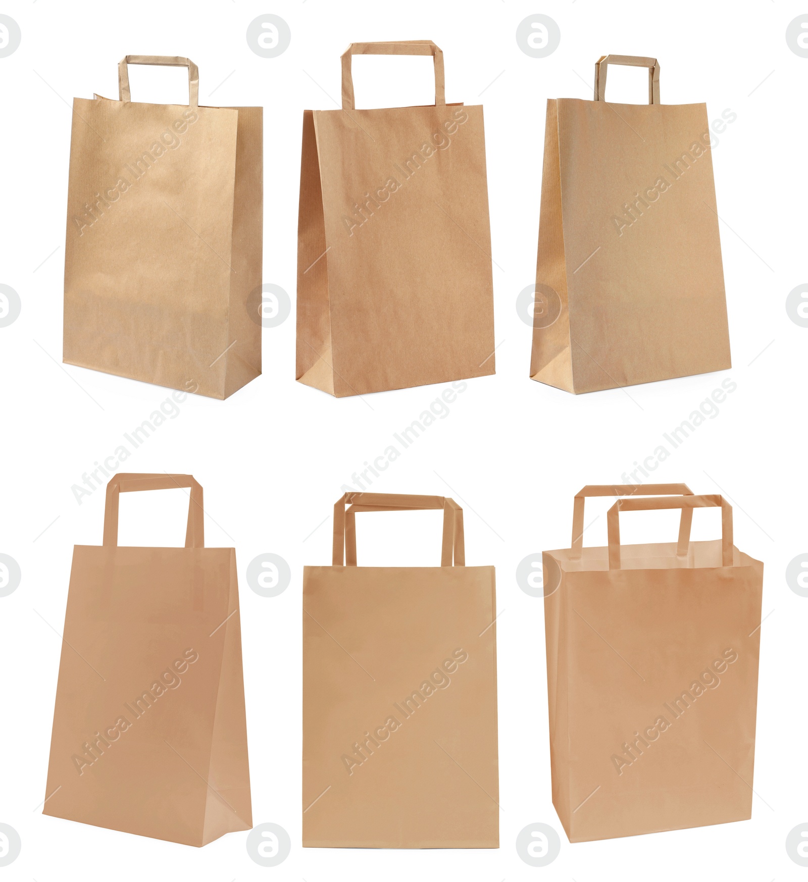 Image of Set with kraft paper bags on white background