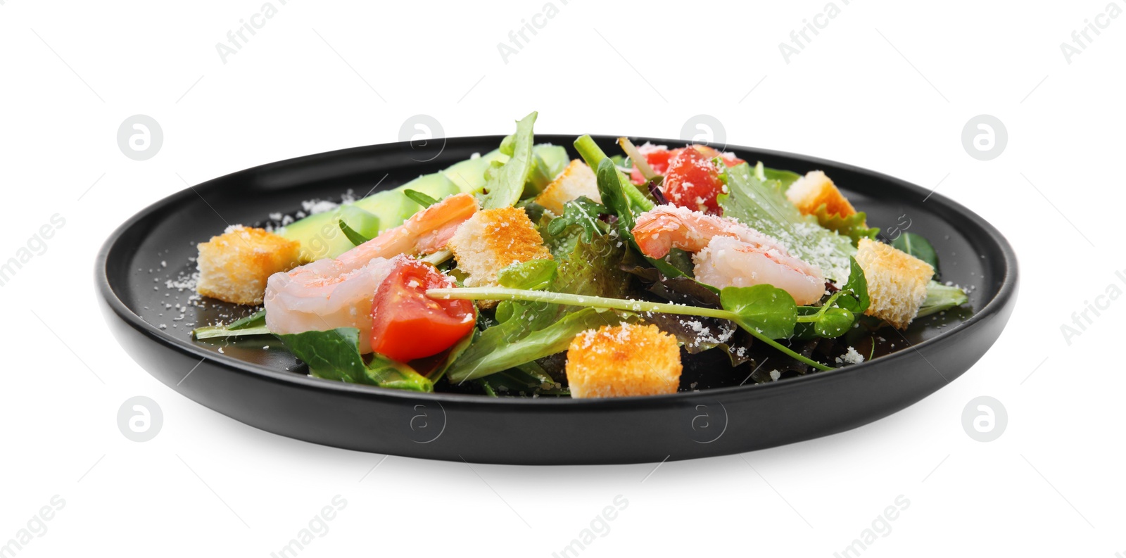 Photo of Delicious salad with croutons, avocado and shrimp isolated on white