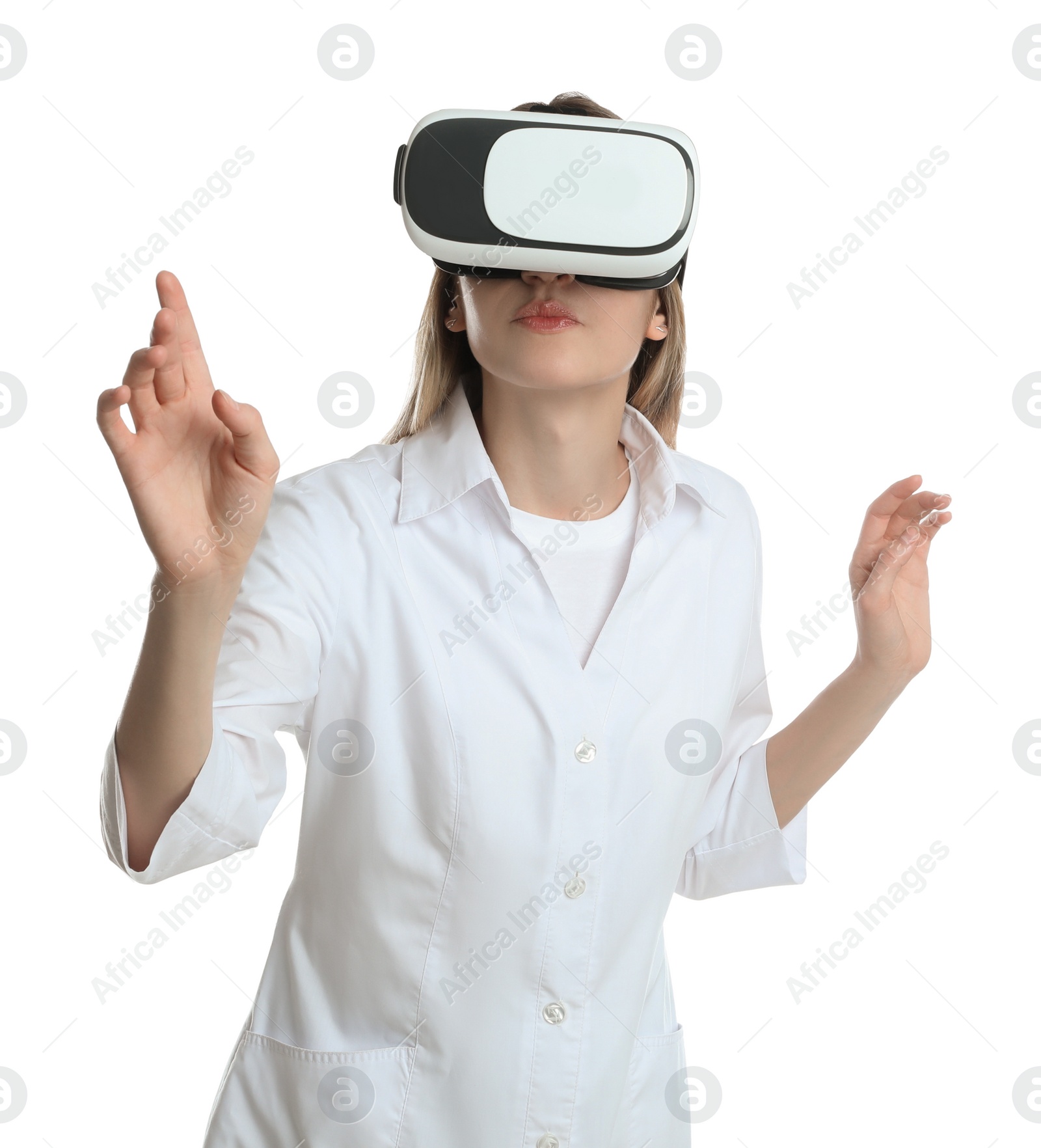 Photo of Young woman using virtual reality headset on white background