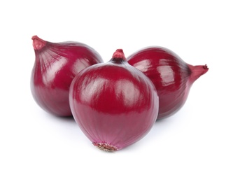 Photo of Fresh whole red onions on white background