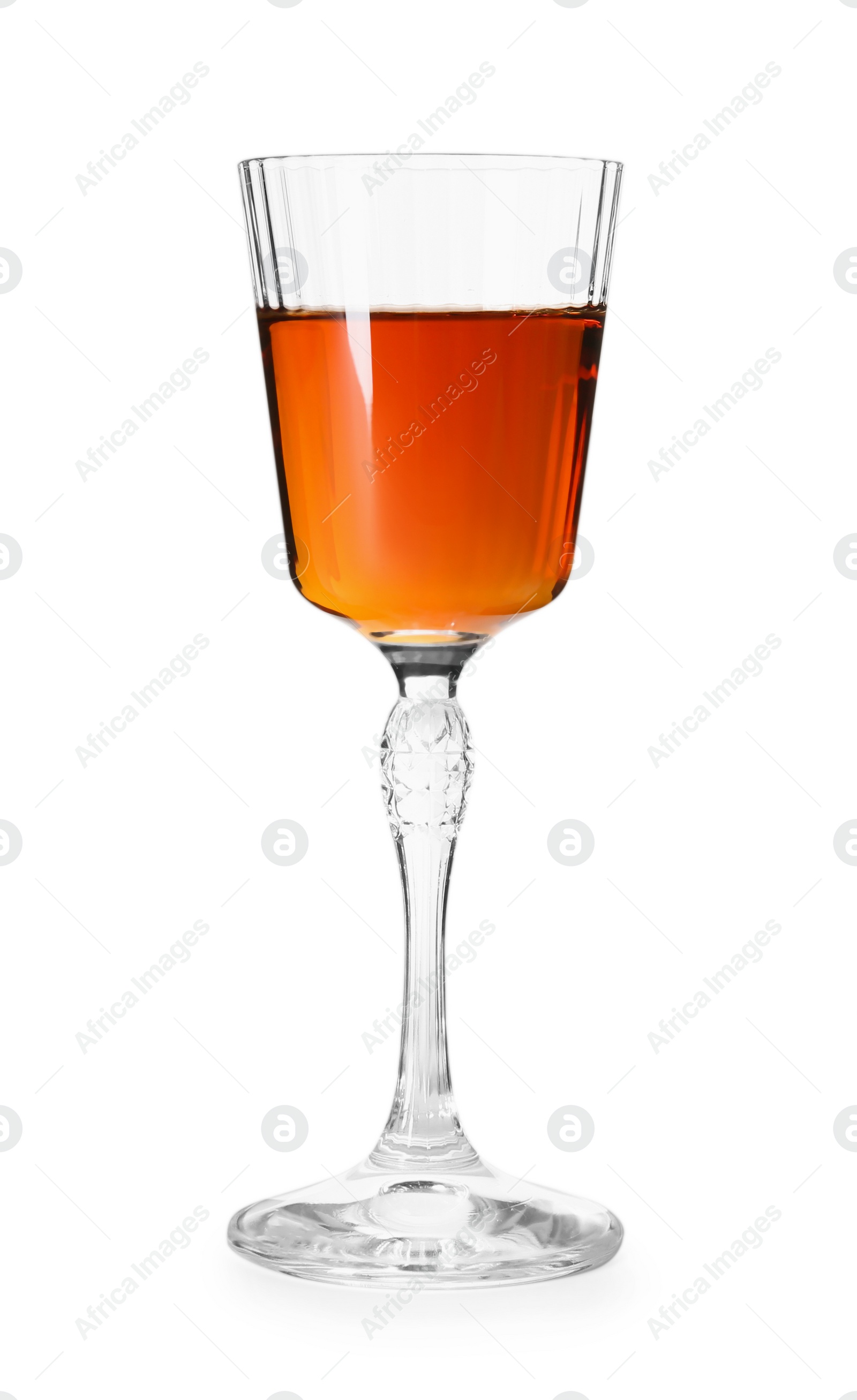 Photo of Liqueur glass with tasty amaretto isolated on white