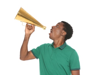 Photo of Young African-American man shouting into megaphone on white background