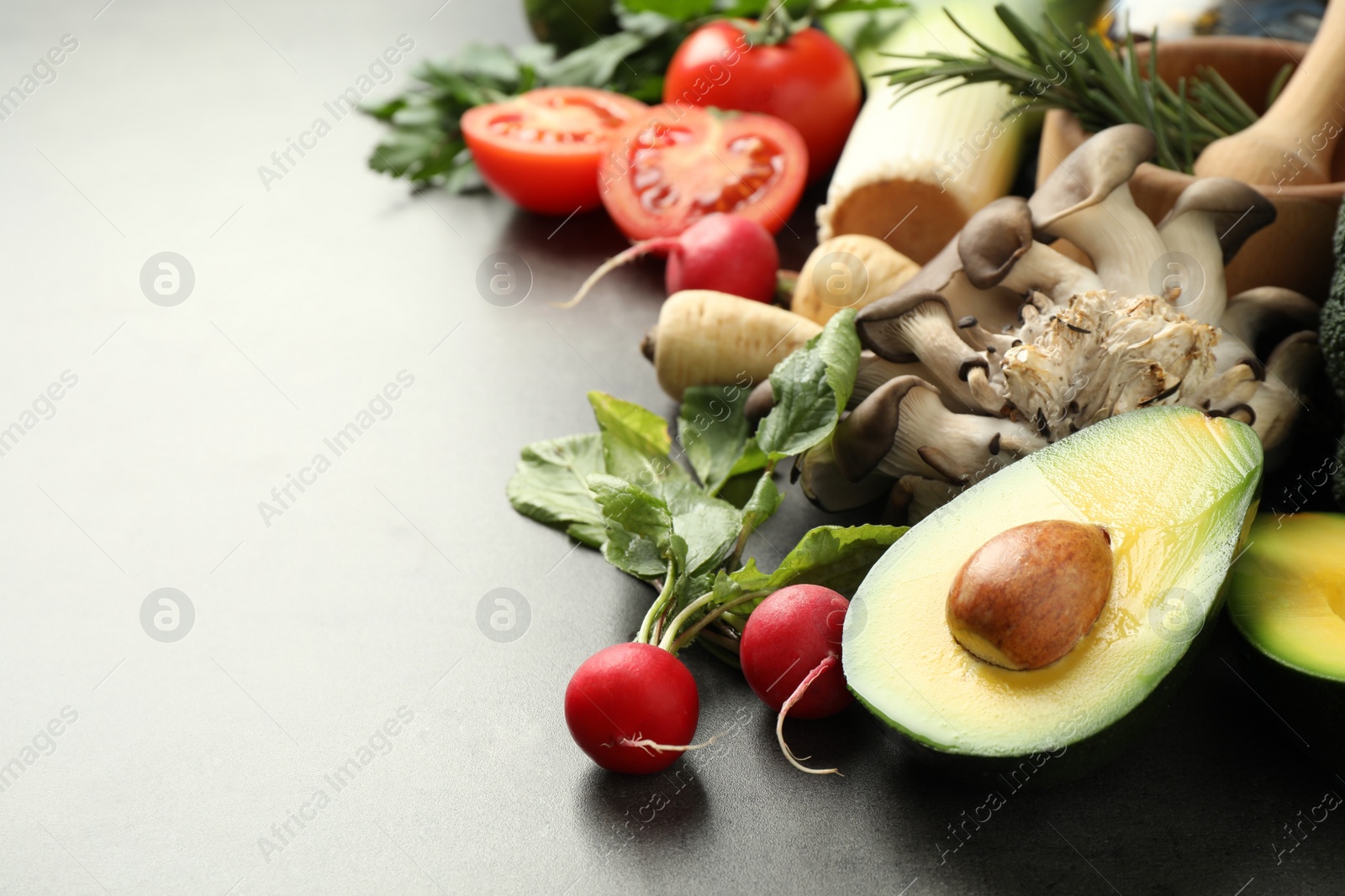 Photo of Fresh products on grey table, space for text. Healthy cooking