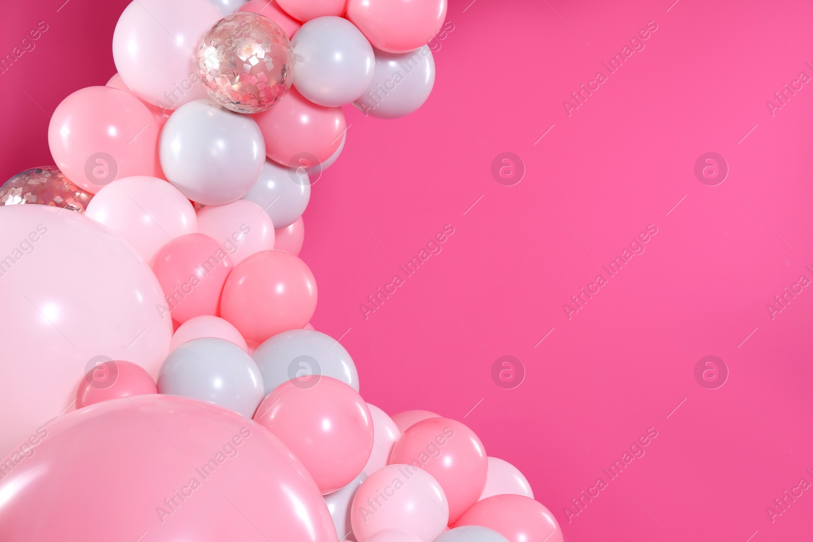 Photo of Beautiful composition with balloons on pink background. Space for text