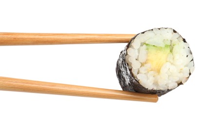 Photo of Chopsticks with tasty fresh sushi roll isolated on white