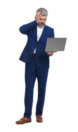 Mature businessman in stylish clothes with laptop on white background