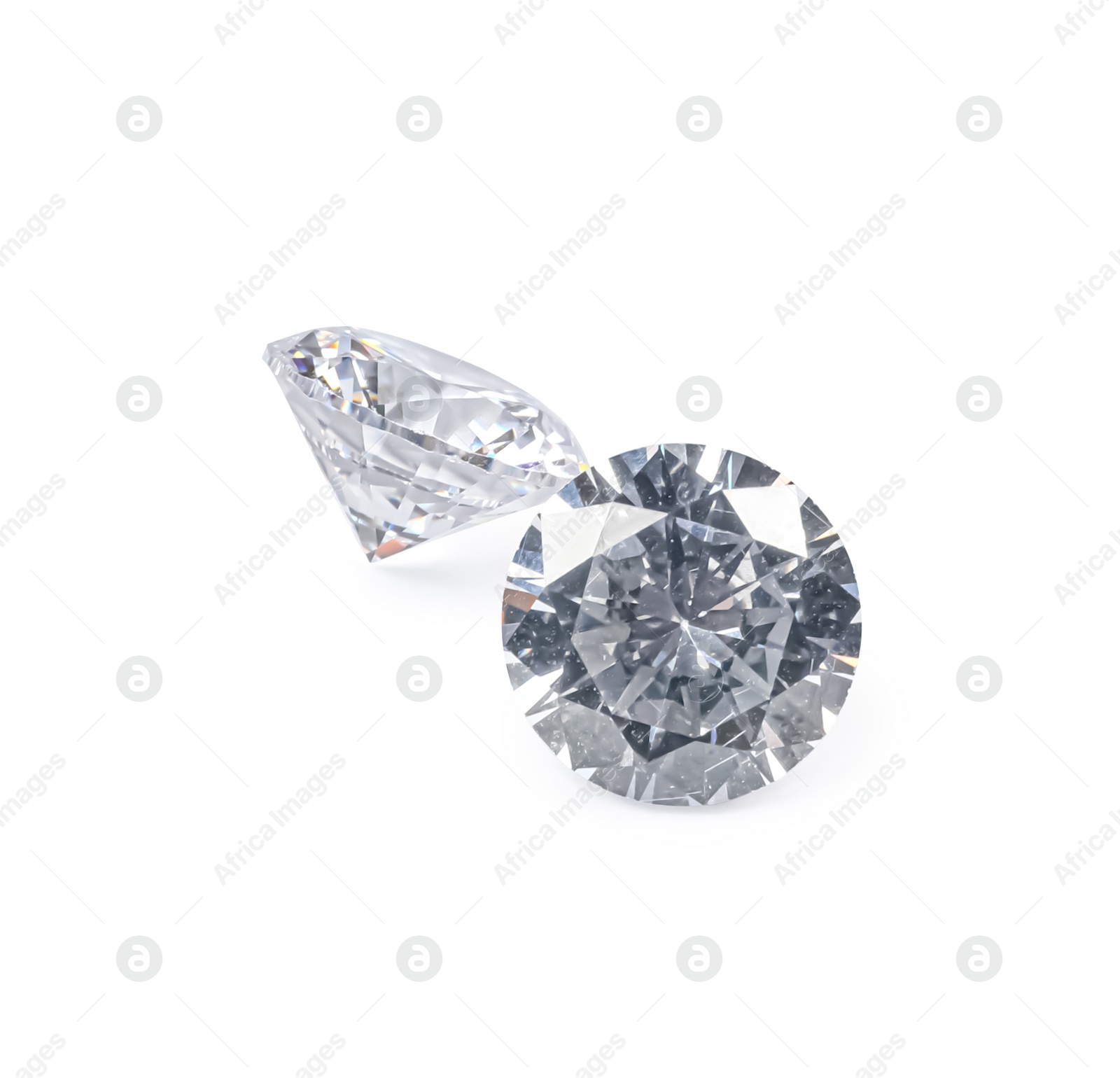 Photo of Different beautiful shiny diamonds isolated on white