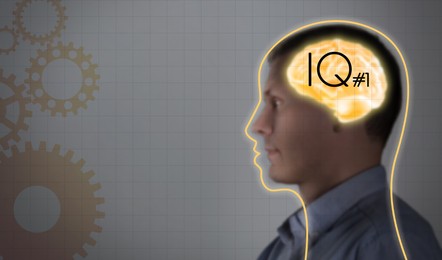 Image of Illustrated brain and blurred view of man on grey background. IQ test