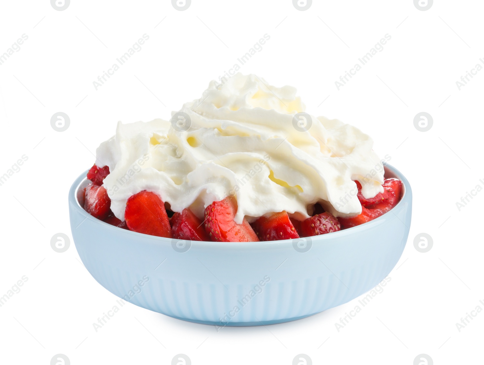 Photo of Tasty sliced strawberry with whipped cream in bowl isolated on white