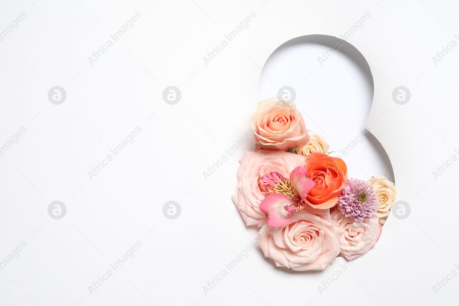 Photo of 8 March greeting card design with flowers and space for text, top view. Happy International Women's Day