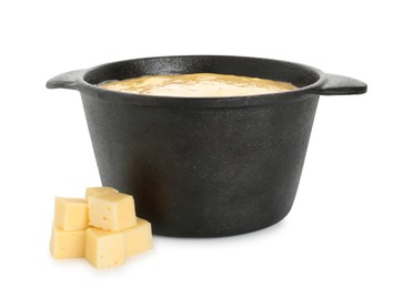 Photo of Fondue with tasty melted cheese and pieces isolated on white