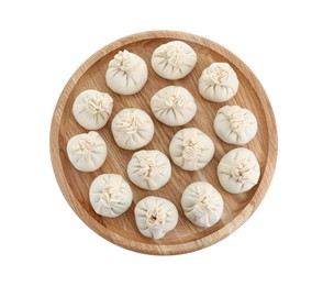 Board with uncooked khinkali (dumplings) isolated on white, top view. Georgian cuisine