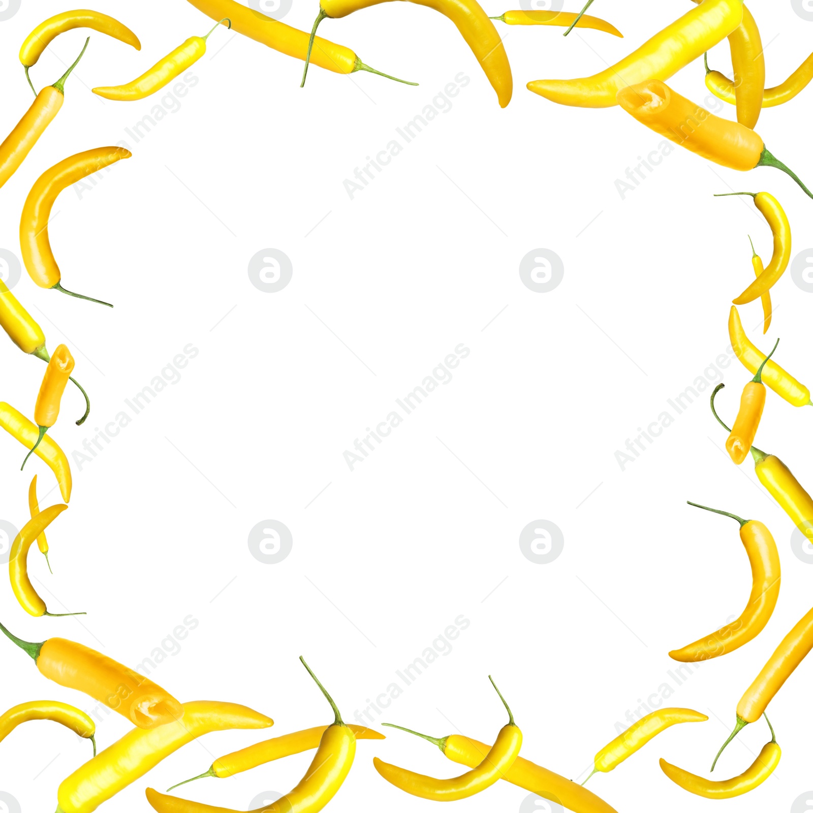 Image of Frame made of ripe yellow chili peppers on white background 