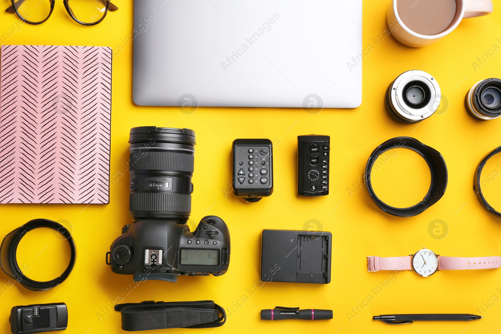 Photo of Flat lay composition with photographer's equipment and accessories on color background