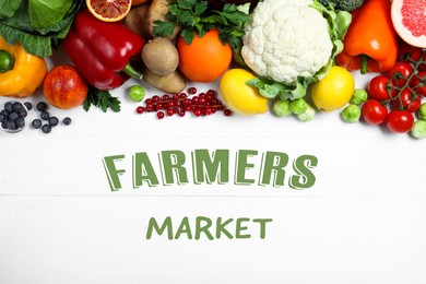 Image of Fresh products rich in vitamin C on white wooden table, flat lay. Farmers market