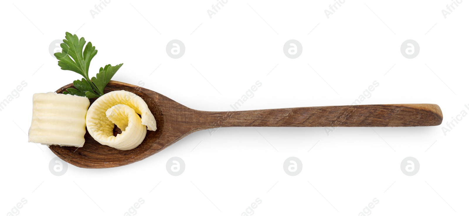 Photo of Tasty butter curls and fresh parsley in spoon isolated on white, top view