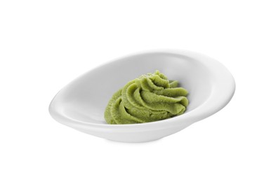 Bowl with swirl of wasabi paste isolated on white