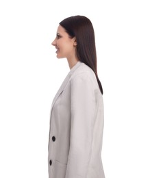 Young businesswoman in suit standing on white background