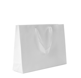 Photo of Paper shopping bag isolated on white. Mock up for design