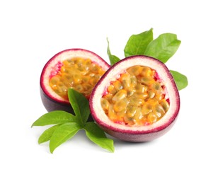 Photo of Cut ripe passion fruit with leaves isolated on white