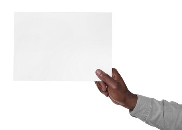 African American man holding sheet of paper on white background, closeup. Mockup for design