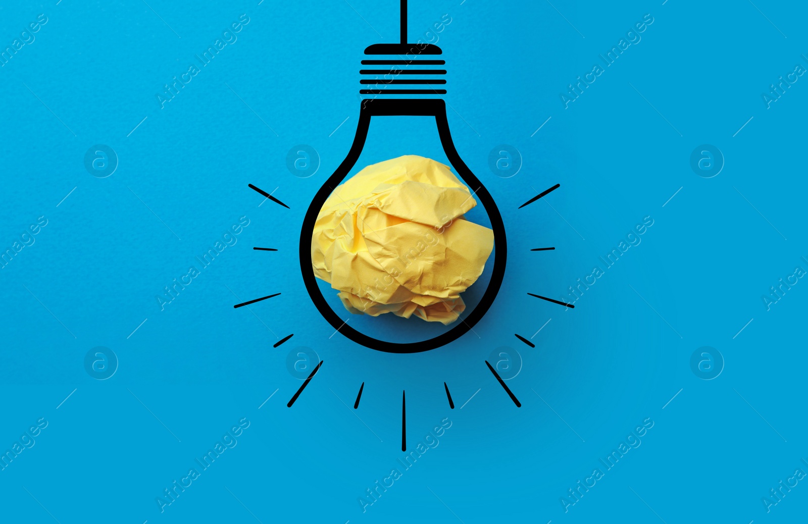 Image of Idea. Illustration of light bulb around crumpled paper ball on light blue background, top view