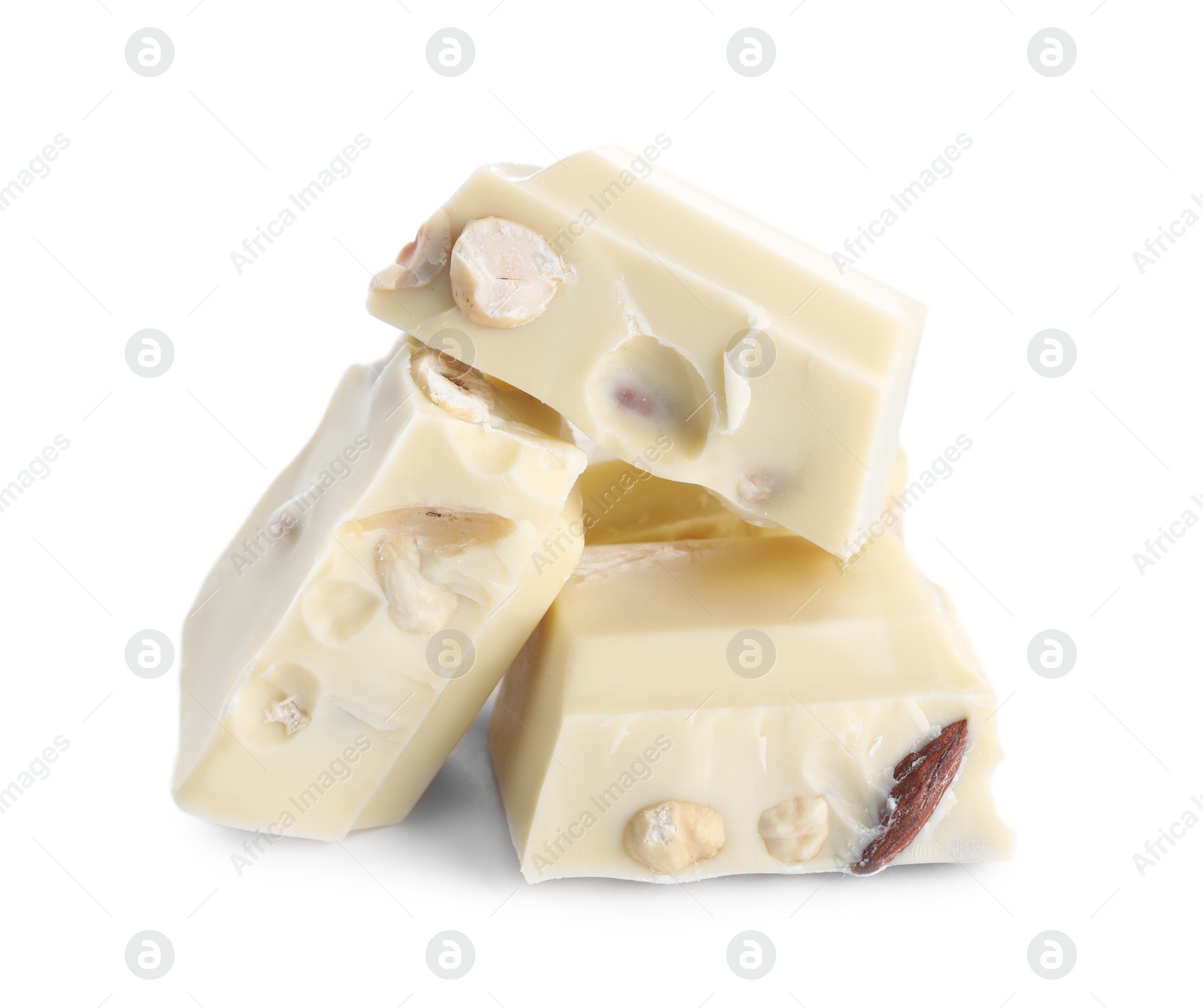 Photo of Pieces of tasty chocolate with nuts isolated on white