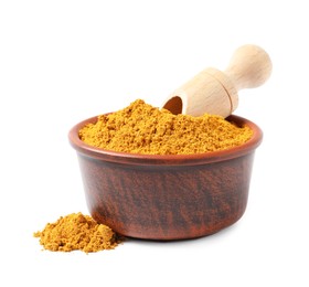 Photo of Curry powder in bowl and scoop isolated on white