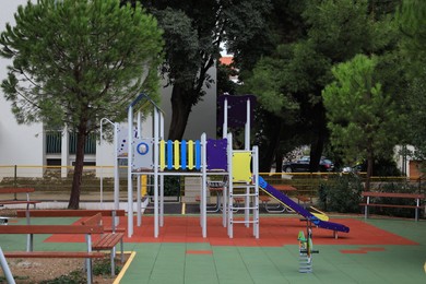 Colorful outdoor playground for children in residential area
