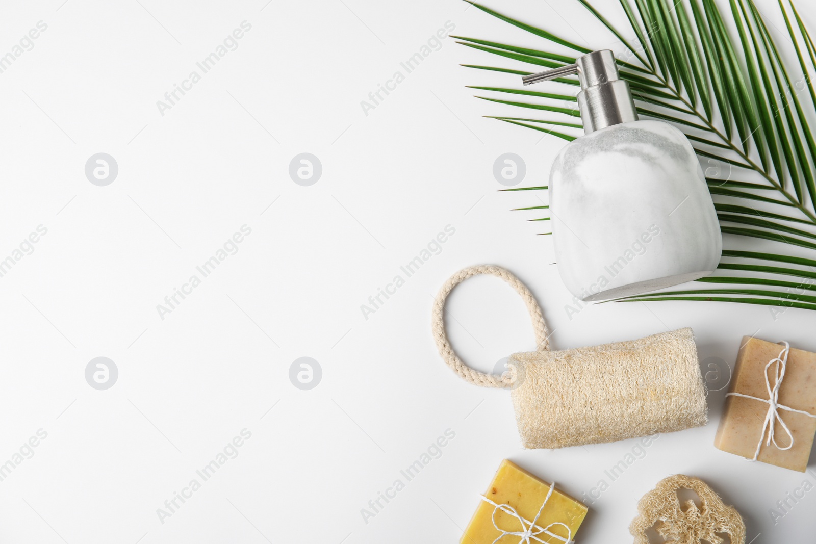 Photo of Flat lay composition with marble soap dispenser on white background. Space for text