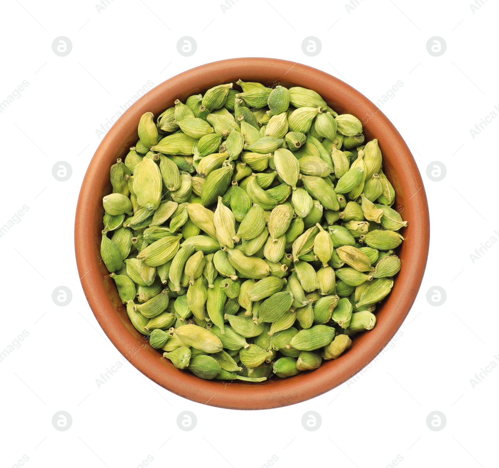 Photo of Ceramic bowl with dry cardamom seeds isolated on white, top view