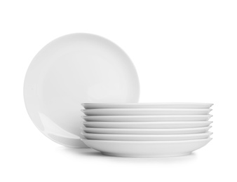 Stack of ceramic dishware on white background