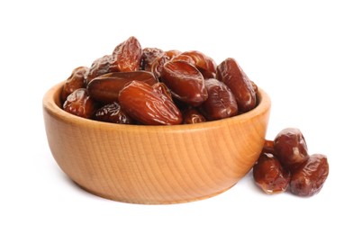 Photo of Sweet dried dates in wooden bowl on white background