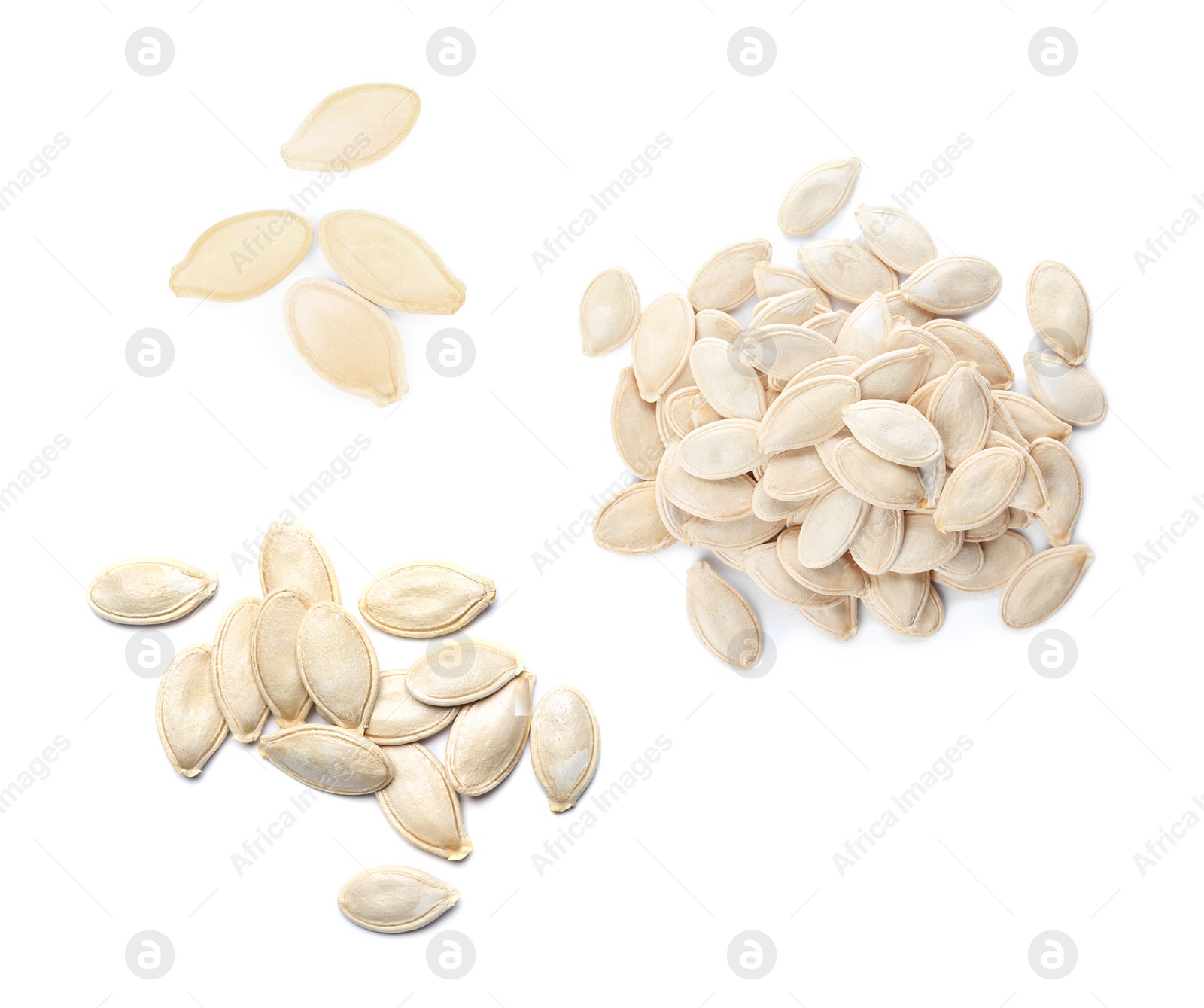 Image of Set of raw pumpkin seeds on white background, top view 