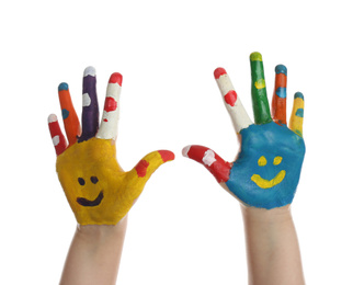Photo of Kid with smiling faces drawn on palms against white background, closeup