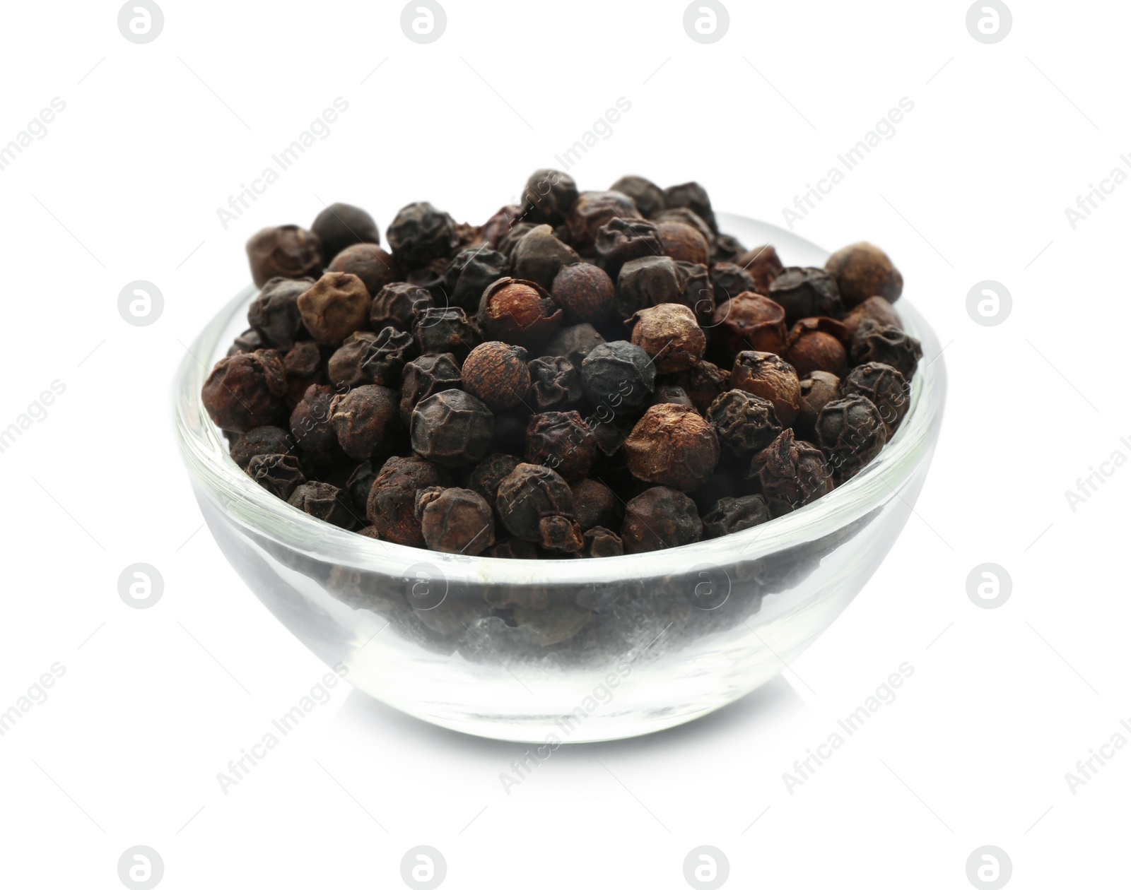 Photo of Glass bowl with black pepper grains on white background