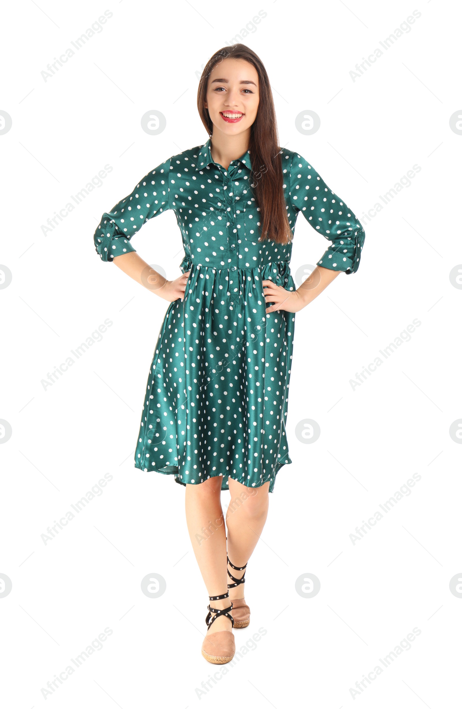 Photo of Portrait of beautiful young woman in stylish dress on white background