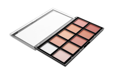 Photo of Colorful contouring palette on white background. Professional cosmetic product