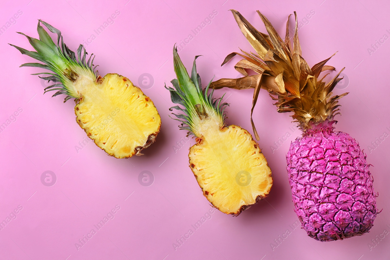 Photo of Fresh pineapples on color background, flat lay