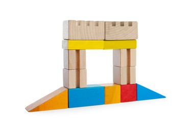 Photo of Wooden gate made of building blocks isolated on white. Educational toy for motor skills development