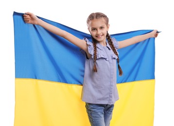 Photo of Happy girl with flag of Ukraine on white background
