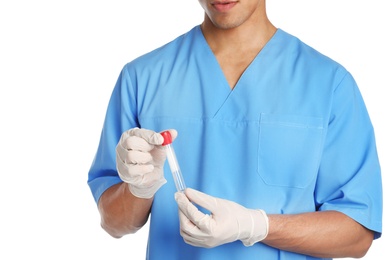 Photo of Male doctor holding empty test tube on white background, closeup. Medical object