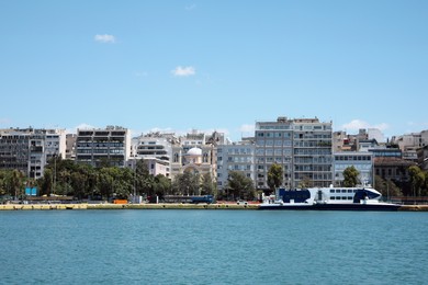Photo of Picturesque view of port with modern boats on sunny day