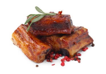 Photo of Tasty roasted pork ribs, rosemary and peppercorns isolated on white