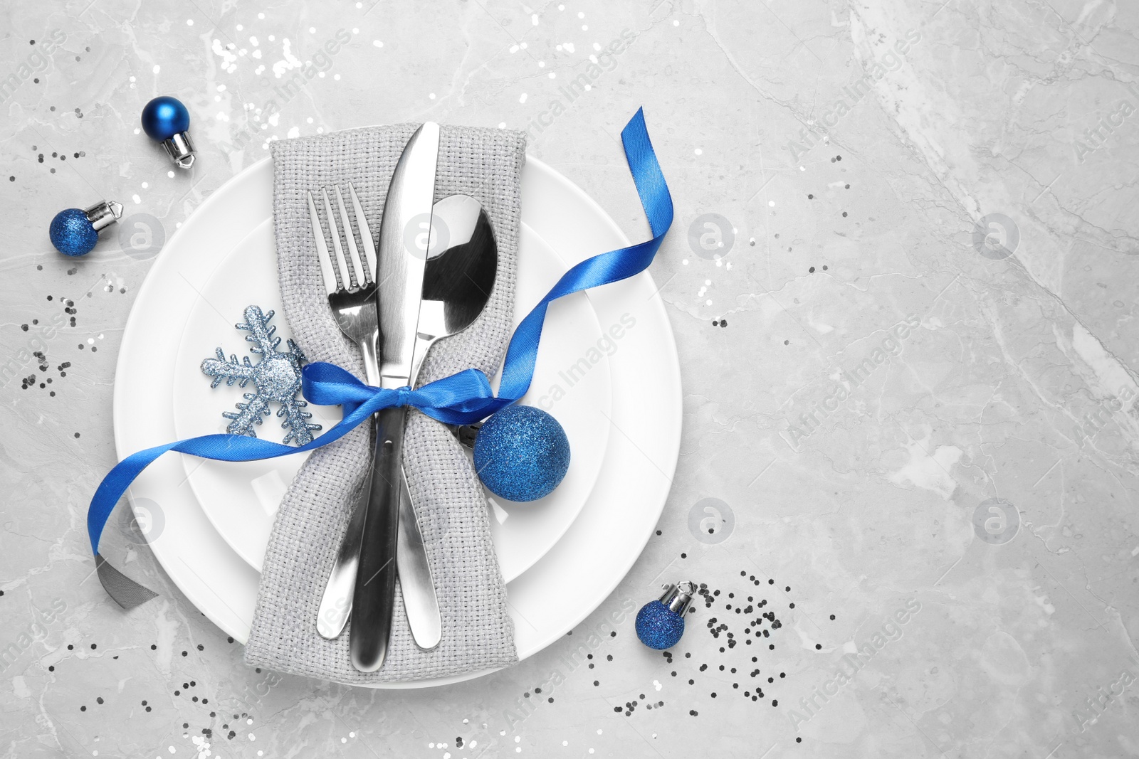 Photo of Beautiful Christmas table setting on grey background, flat lay. Space for text