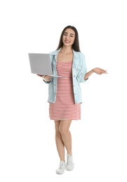 Photo of Full length portrait of young woman in casual outfit with laptop on white background